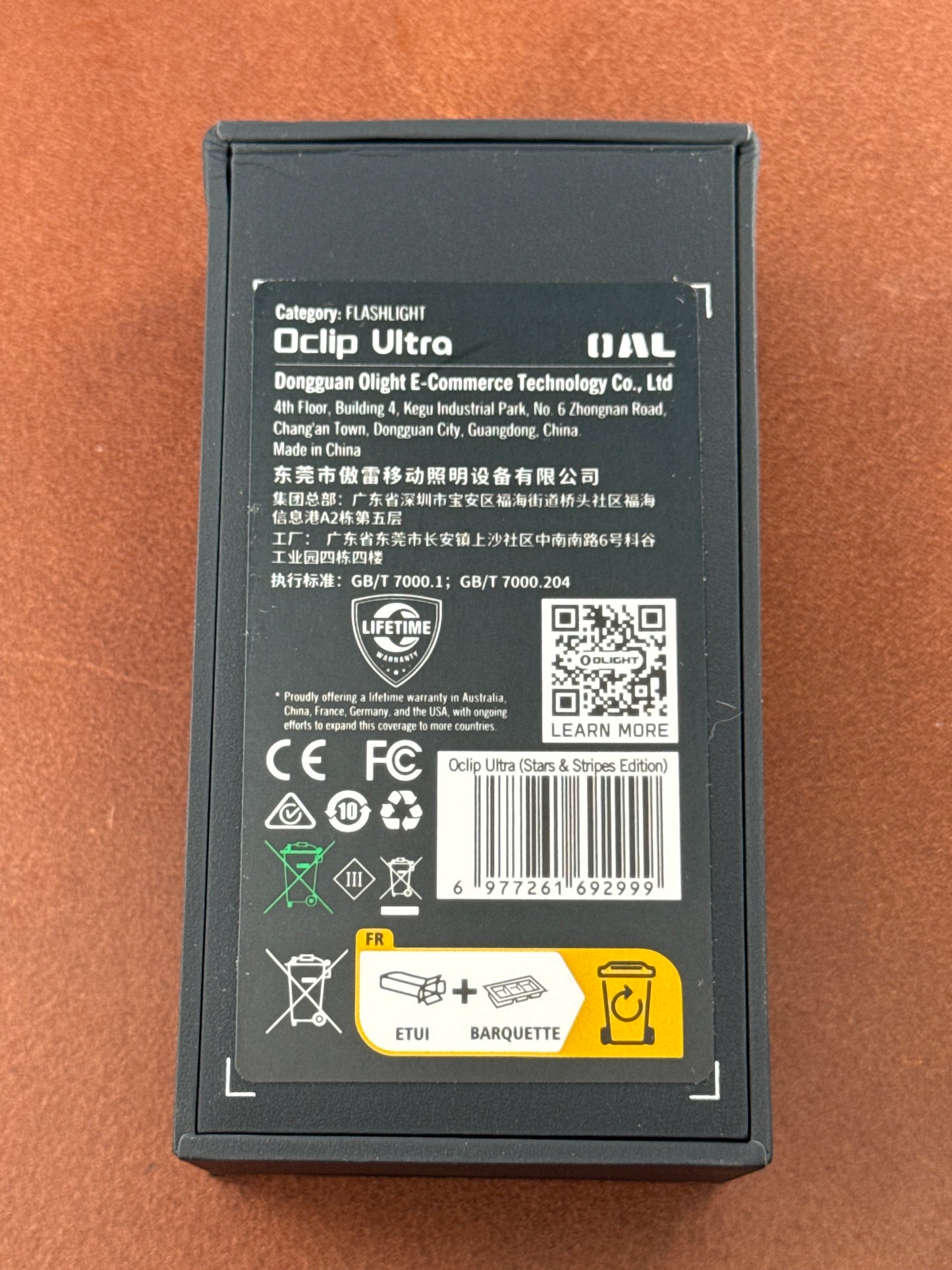 Oclip Ultra Clip-On EDC Light with Flood, Spot, and UV Modes. Red white and blue