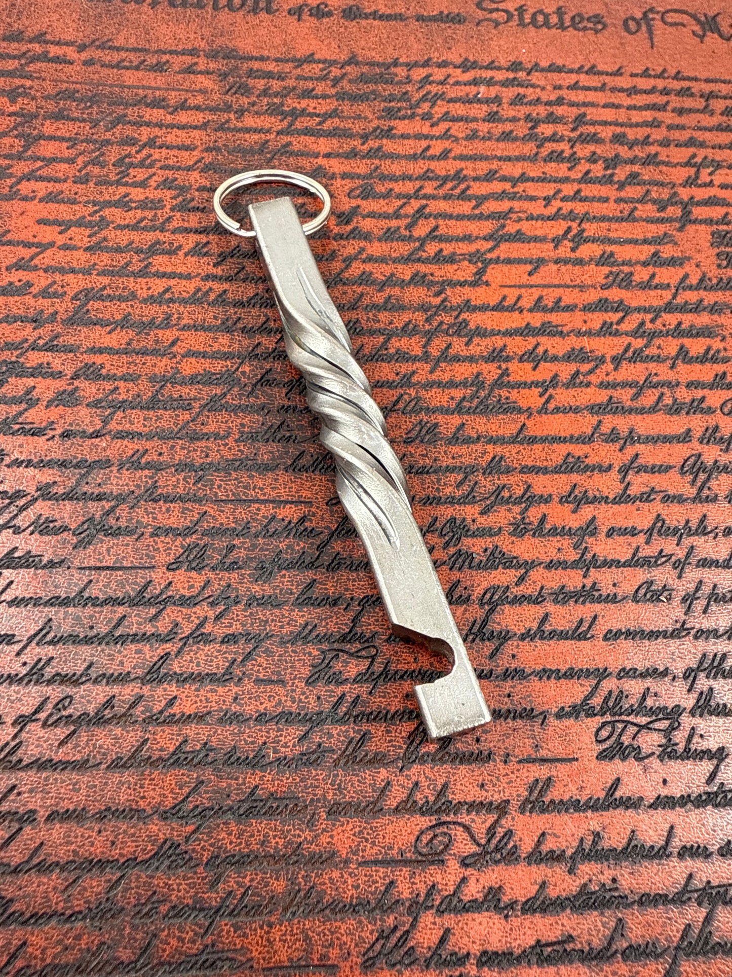 Forged twisted bottle opener