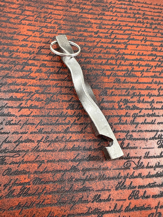 Forged wavy bottle opener