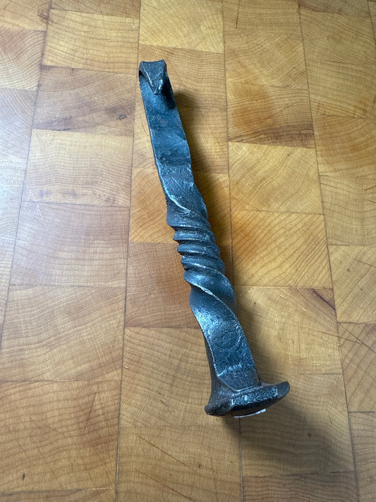 Railroad spike bottle opener