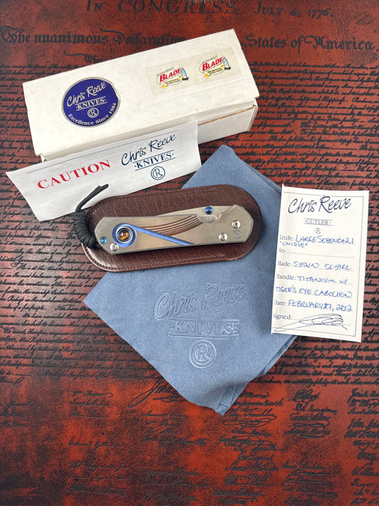 Chris Reeve large Sebenza21 ( unique graphic w tiger eye inlay )