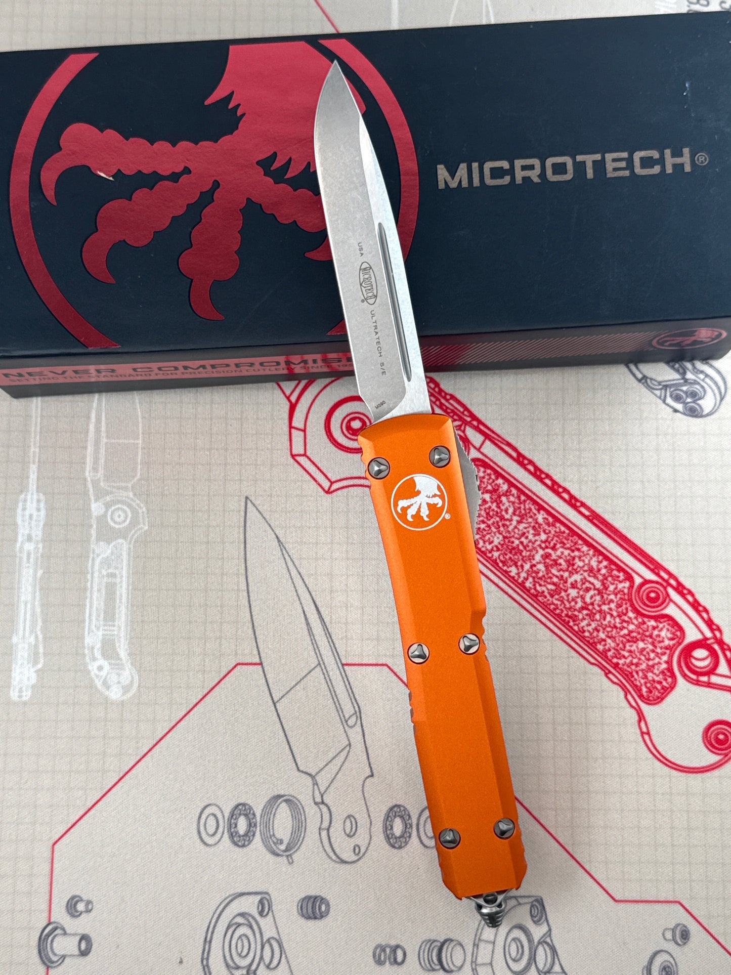 Microtech Ultratech ( pre owned never carried with box has tiny chip in paint under clip shown in last photo )